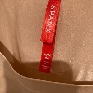 Spanx shapewear 

Great fabric, form fitting shape wear